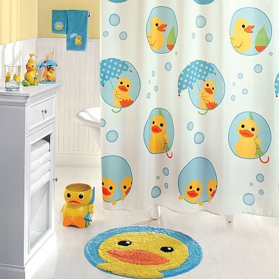 white bathroom with rubber duck accessories